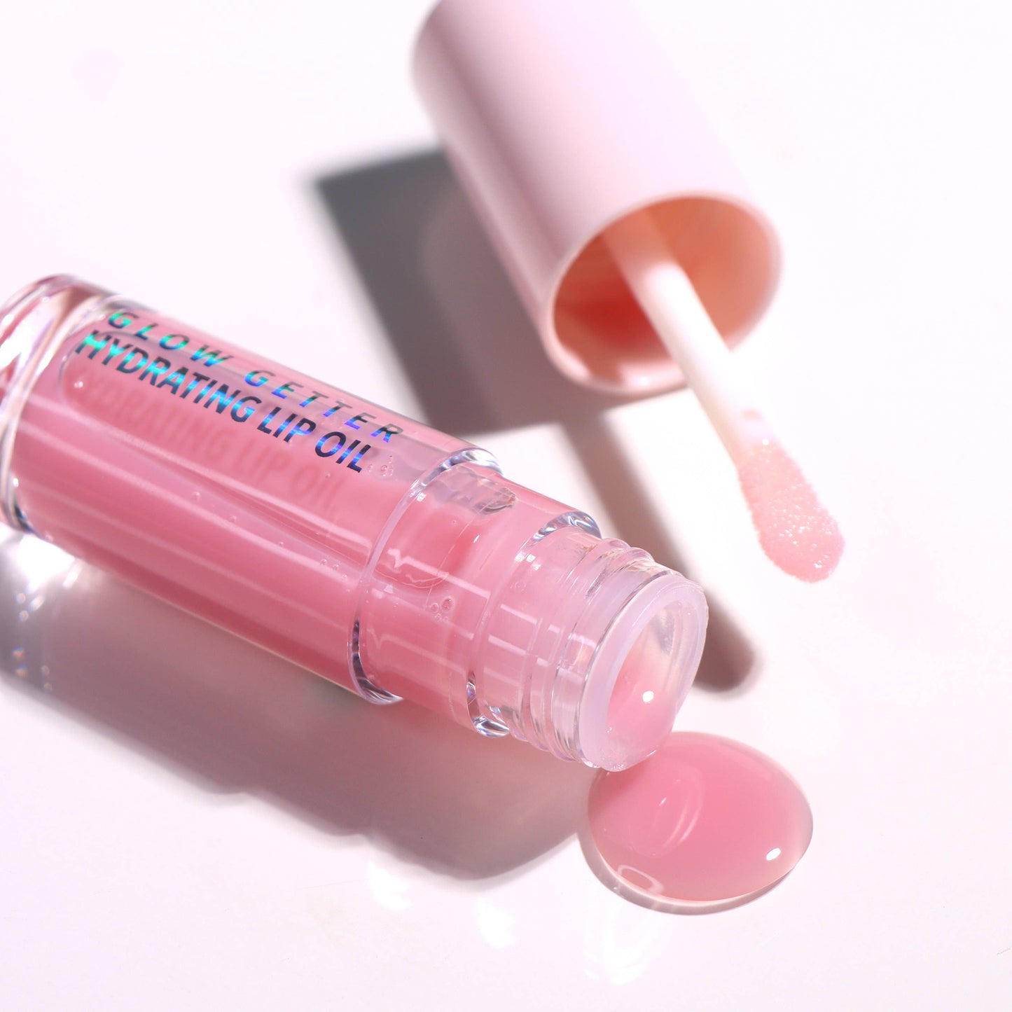 Glow Getter Lip Oil ( BUBBLE PINK)
