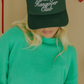 holiday hangover club trucker hat